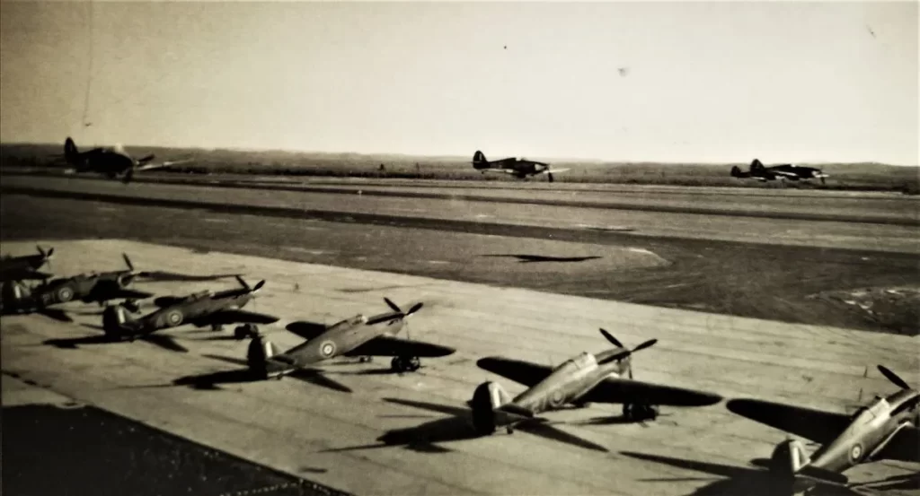 One of Harold's photographs showing Hurricanes taking off and lining the runway in North Africa, possibly at the RAF El Daba airfield in Egypt